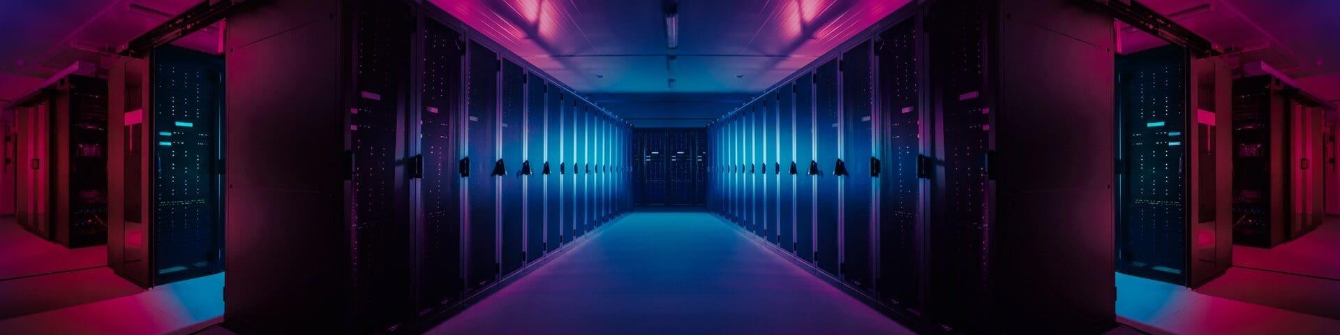 Wide-Angle Panorama Shot of a Working Data Center With Rows of Rack Servers. Red Emergency Led Lights Blinking and Computers are Working. Dark Ambient Light.